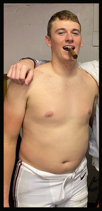 New England Patriots Quarterback Mac Jones flashing his dad bod postgame.
